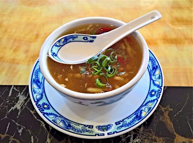 Chinese Soup spoon on a soup bowl