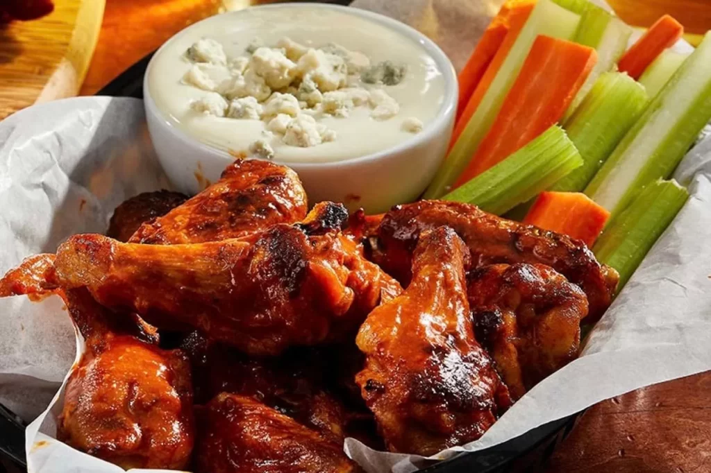Buffalo wings with the signature mandatory glaze 